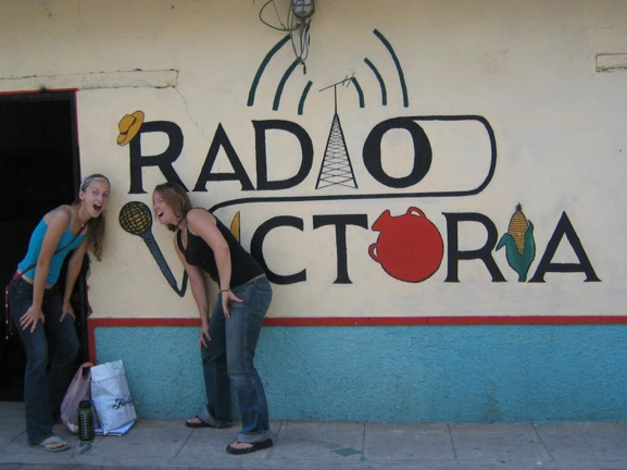 Volunteers at Radio Victoria in El Salvador interact with the mural mike.